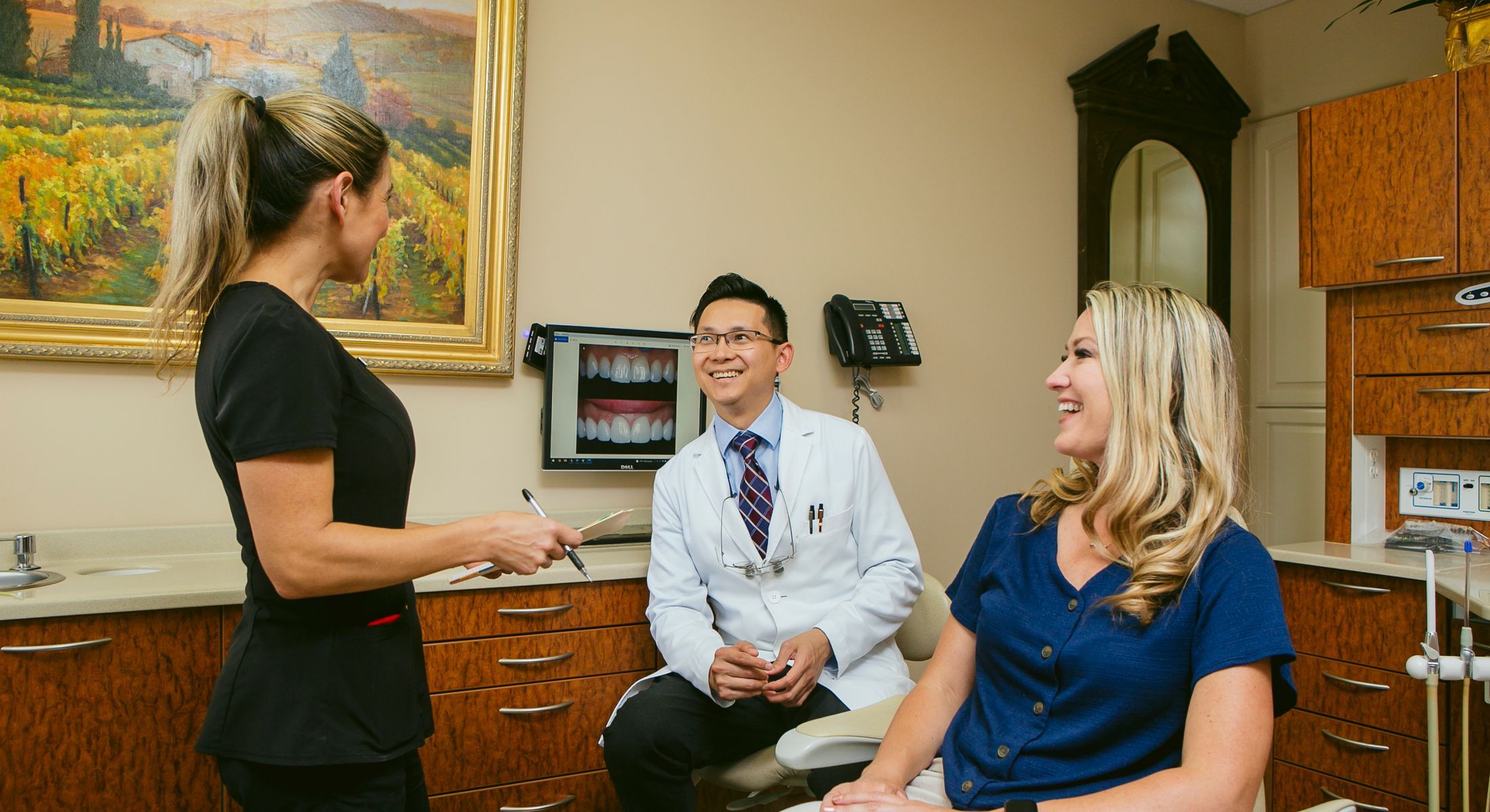 Dr. Chau and staff with patient